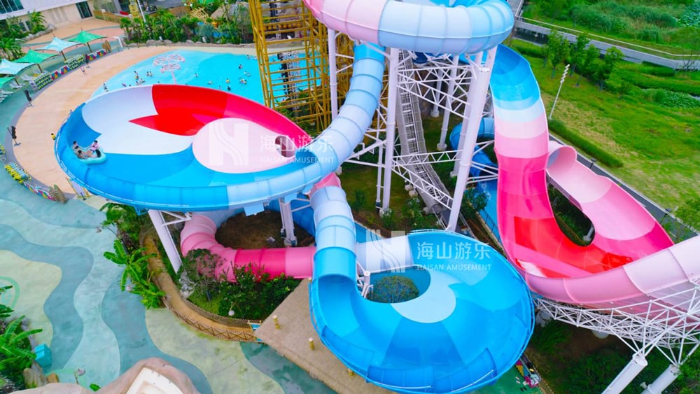 双重风暴，极致竞速——星际盘旋+巨浪翻滚组合引爆水乐园刺激体验